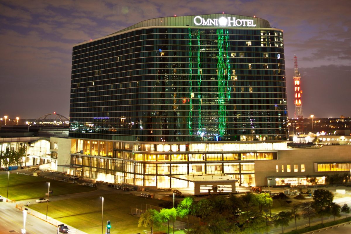 Omni Hotel Dallas tower lit at night