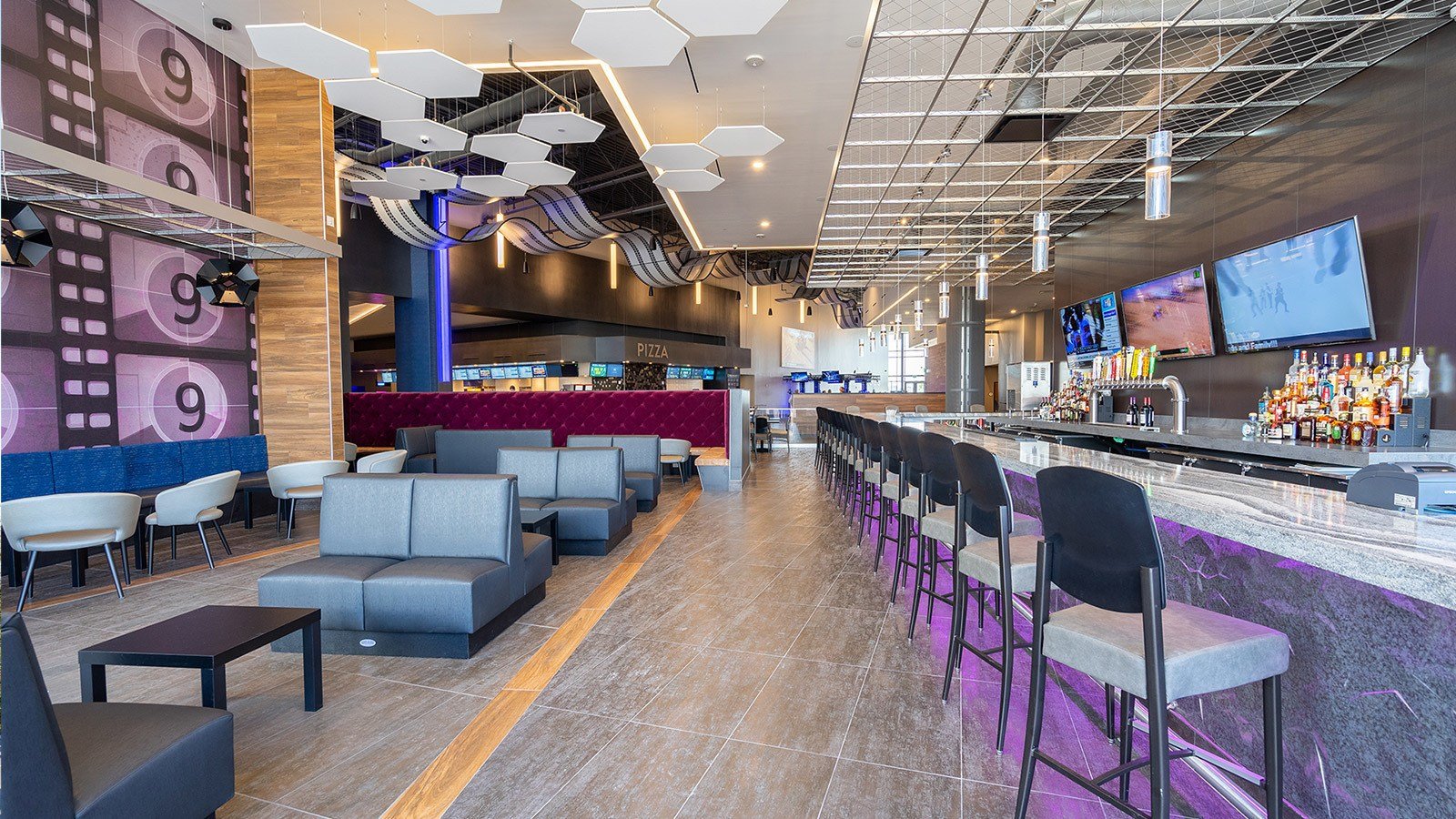 Santikos Cibolo lounge and bar with sports TVs and purple under-bar lighting