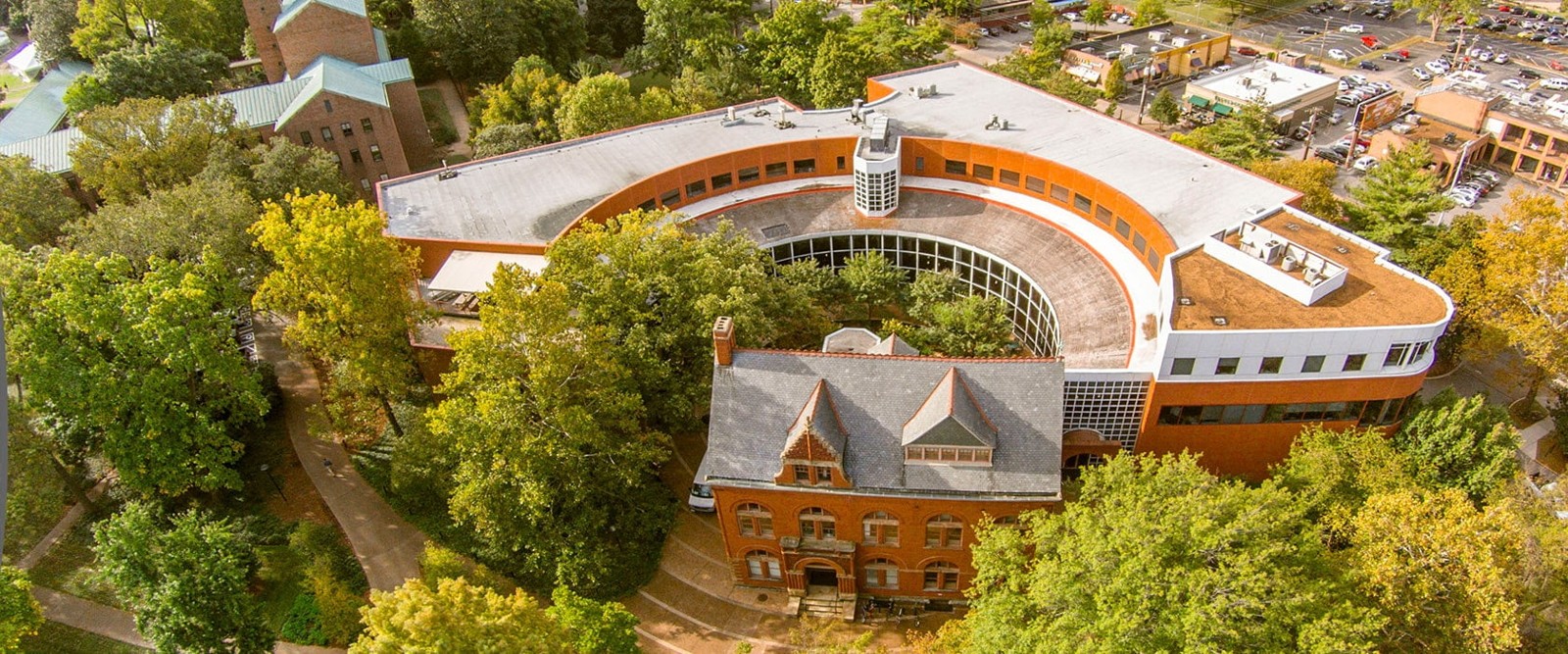 Aerial view of the Vanderbilt Owen Graduate School of Management curved building and campus in Nashville